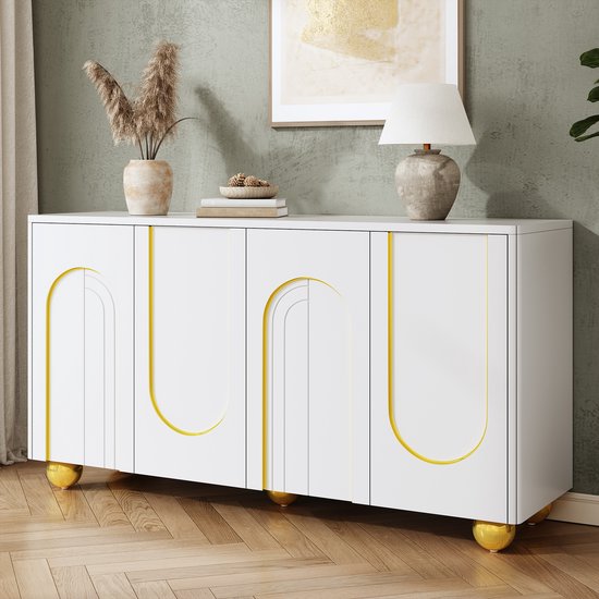 Meuble blanc à quatre portes, avec des lignes dorées et des pieds dorés en forme de boule.