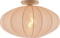 Beige, ovale lampenkap met geribd patroon, verlicht door een peertje.
