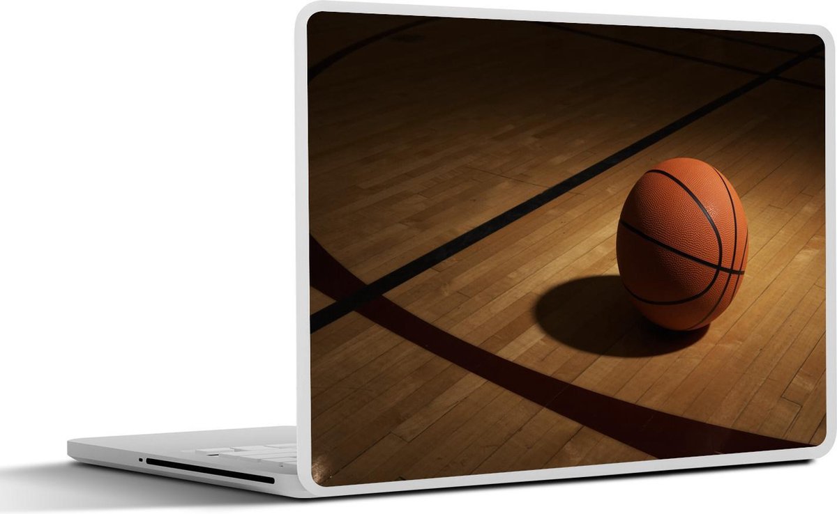 Laptop sticker - 12.3 inch - Een basketbal in de spotlight op een basketbalveld - 30x22cm - Laptopstickers - Laptop skin - Cover