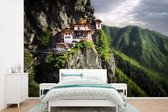 Behang - Fotobehang Boeddhistische tempel in Bhutan - Breedte 390 cm x hoogte 260 cm