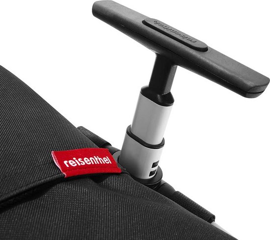 Detail van de uittrekbare handgreep en rode 'reisenthel' label op de zwarte boodschappentrolley.