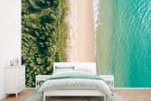 Behang - Fotobehang Strand - Bomen - Water - Breedte 600 cm x hoogte 400 cm