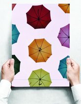 Wandbord: Gekleurde paraplu's patroon op een witte achtergrond - 30 x 42 cm