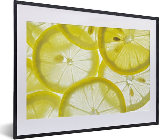 Fotolijst incl. Poster - Licht schijnt door citroen schijven in het water - 40x30 cm - Posterlijst