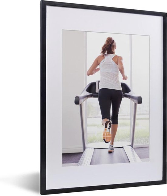 Fotolijst incl. Poster - Een vrouw doet aan fitness op een loopband - 30x40 cm - Posterlijst