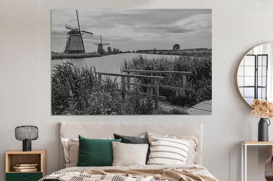 Photo Zwart et blanc des moulins à vent de Kinderdijk aux Nederland Toile 180x120 cm - Tirage photo sur toile (Décoration murale salon / chambre) XXL / Groot format!