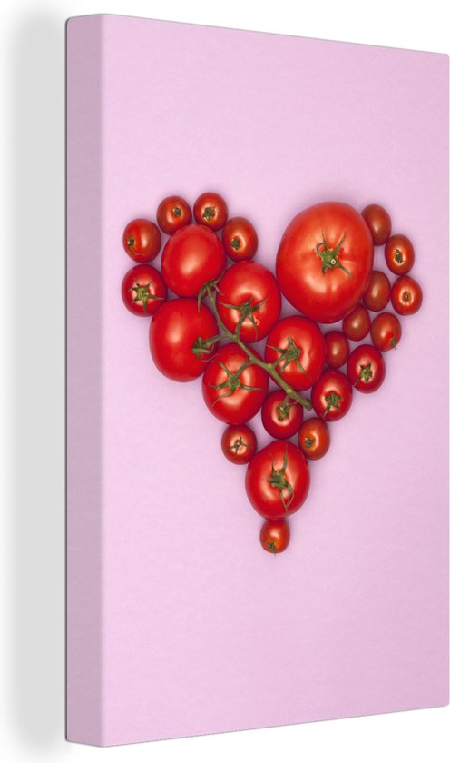 Canvas Schilderij Tomaten in de vorm van een hart op een roze achtergrond - 20x30 cm - Wanddecoratie