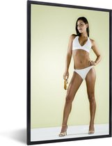 Fotolijst incl. Poster - Vrouw in een witte bikini met hakken - 20x30 cm - Posterlijst