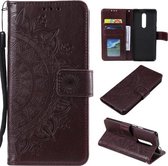 Voor Nokia 2.4 Totem Bloem Reliëf Horizontale Flip TPU + PU lederen tas met houder & kaartsleuven & portemonnee (bruin)