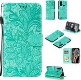 Voor Motorola Moto G8 Power Lite Lace Flower Embossing Pattern Horizontale Flip Leather Case, met houder & kaartsleuven & portemonnee & fotolijst & Lanyard (groen)