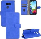 Voor LG K40S Effen Kleur Huidgevoel Magnetische Gesp Horizontale Flip Kalf Textuur PU Lederen Case met Houder & Kaartsleuven & Portemonnee (Blauw)