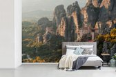 Behang - Fotobehang Zonsopgang bij de Meteora kloosters in Griekenland - Breedte 390 cm x hoogte 260 cm