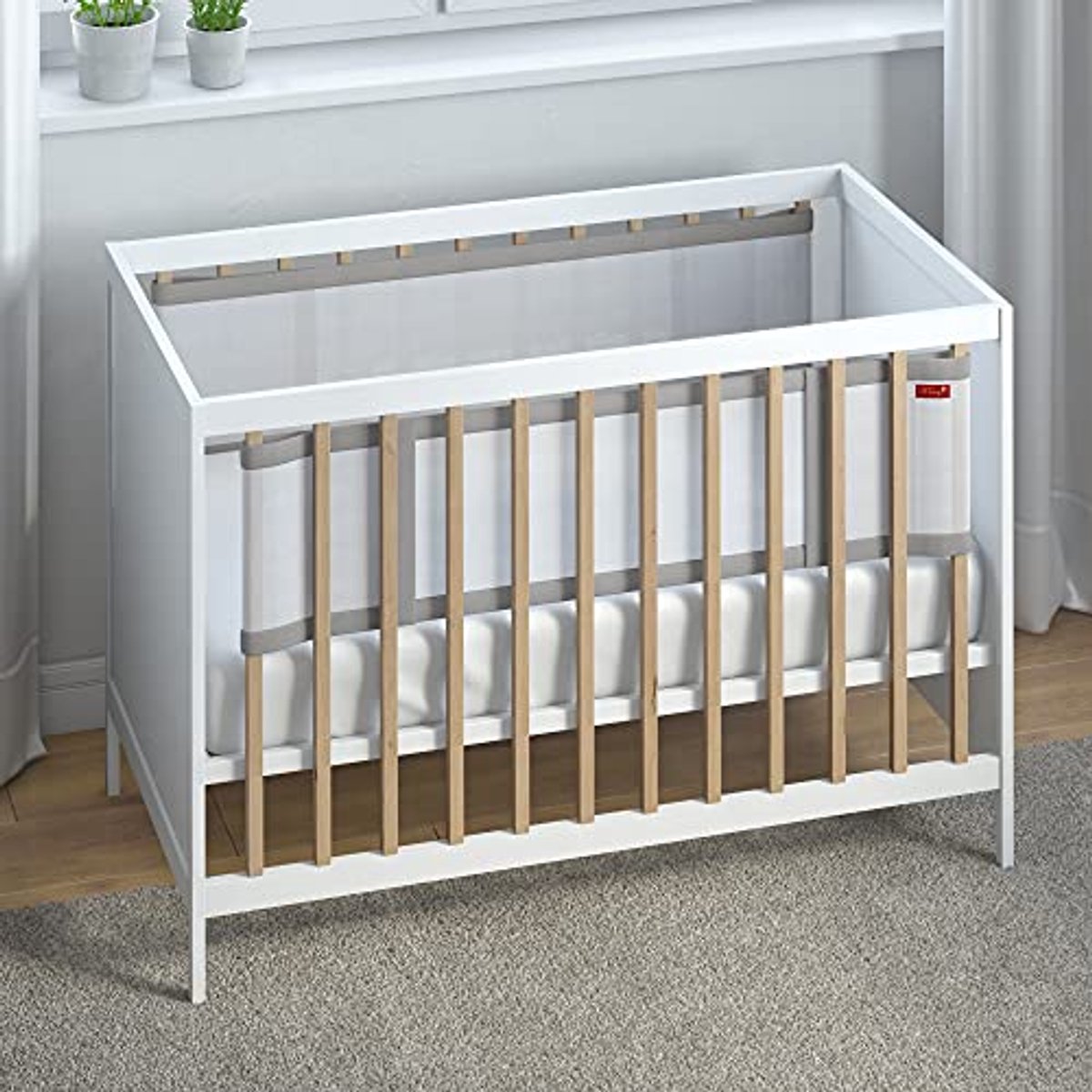 Image of Ademend Babyspeelbedomranding voor Tweezijdige Bedden - Veilig en Comfortabel