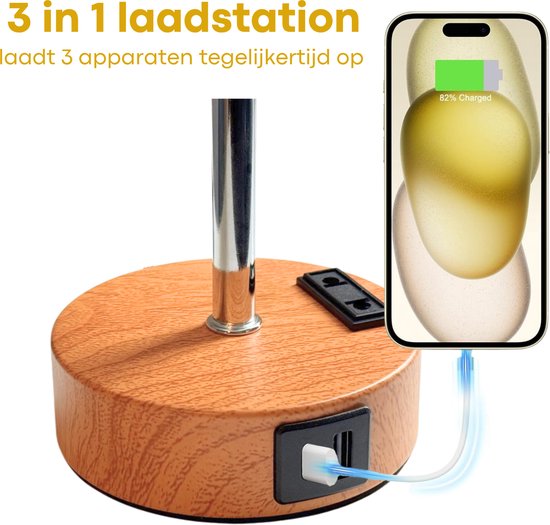 Gros plan sur la base de lampe en bois avec USB-A, USB-C et prise, charge un smartphone.