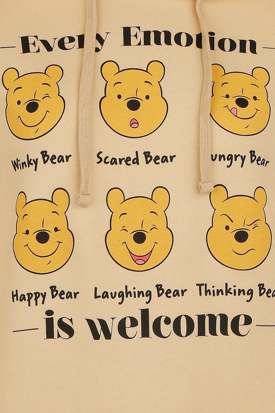 Beige trui met capuchon met zes verschillende gezichtsuitdrukkingen van Winnie de Poeh, waaronder 'Winky Bear', 'Scared Bear' en 'Happy Bear'. Tekst: 'Every Emotion - is welcome'.