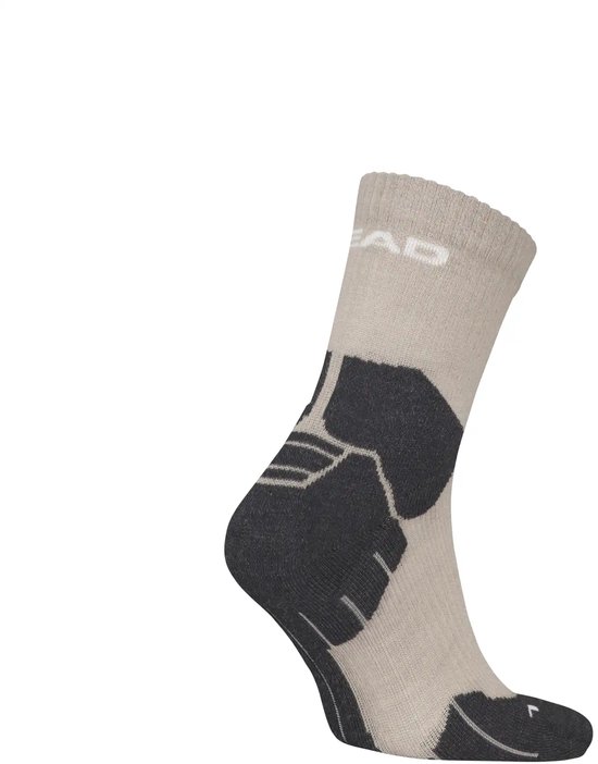 Beige sok met zwarte accenten bij de hiel en neus. "HEAD" logo in het zilver op de schacht.