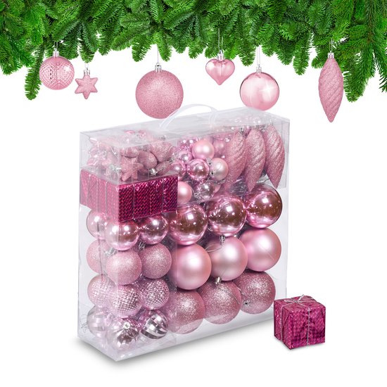 Boîte de boules de Noël roses, d'étoiles, de cœurs et une petite boîte cadeau.