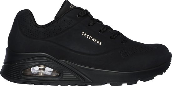 Zwarte Skechers Uno damessneaker met gouden accenten en air-unit in de zool.