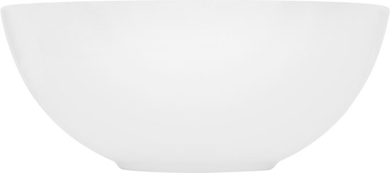 Vue de côté d'un lavabo rond blanc en céramique, isolé sur fond blanc.