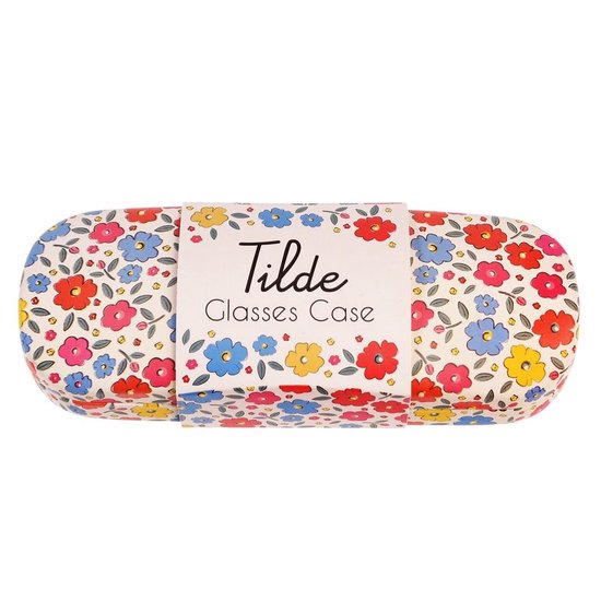 Boîtier à lunettes 'Tilde' avec fond blanc recouvert de petites fleurs rouges, bleues et jaunes et de feuilles vertes.