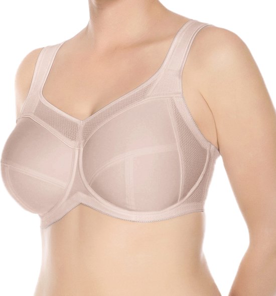 Beige sportbeha gedragen door een model met volle buste en brede bandjes.