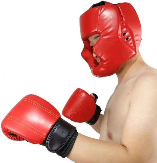 Man met rode bokshandschoenen en rood bokshoofdstuk.