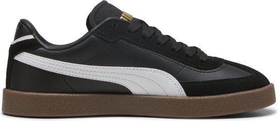 Zwarte sneaker met witte Puma-streep en gouden logo op een bruine zool.