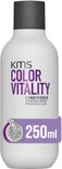 KMS Color Vitality conditioner fles met een afbeelding van een granaatappel en een paarse 250ml label.