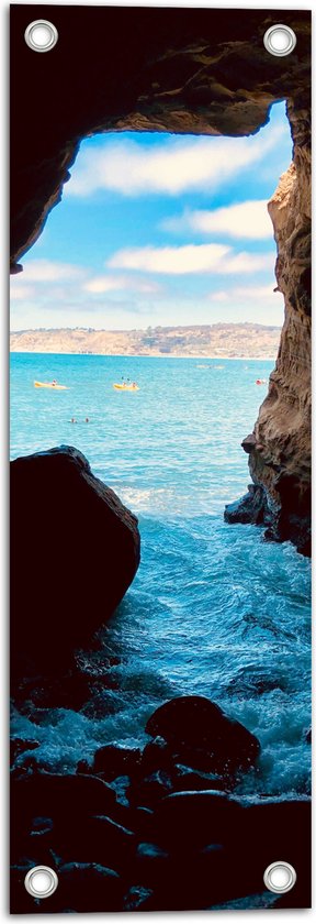 WallClassics - Tuinposter – Pastelkleurige Lucht vanuit Grot met Water - 20x60 cm Foto op Tuinposter  (wanddecoratie voor buiten en binnen)
