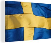 Canvas Schilderij Close-up van de vlag van Zweden - 90x60 cm - Wanddecoratie