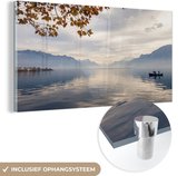MuchoWow® Glasschilderij 80x40 cm - Schilderij acrylglas - Visser dobberend op het Meer van Genève - Foto op glas - Schilderijen
