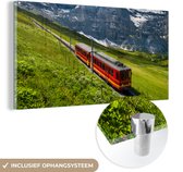 MuchoWow® Glasschilderij 160x80 cm - Schilderij acrylglas - Alpen - Trein - Rood - Foto op glas - Schilderijen
