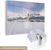 MuchoWow® Glasschilderij 120x80 cm - Schilderij acrylglas - Alpen - Dorp - Sneeuw - Foto op glas - Schilderijen