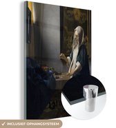 MuchoWow® Glasschilderij 30x40 cm - Schilderij acrylglas - Vrouw met weegschaal - Johannes Vermeer - Foto op glas - Schilderijen