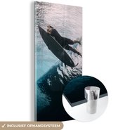 MuchoWow® Glasschilderij 40x80 cm - Schilderij acrylglas - Surfer duikt - Foto op glas - Schilderijen