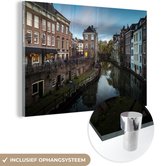 MuchoWow® Glasschilderij 60x40 cm - Schilderij acrylglas - Wolken - Water - Utrecht - Foto op glas - Schilderijen