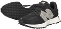 Zwarte New Balance sneakers met luipaardprint N-logo, witte zool en zwarte zool.