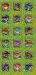 Vellen met Paw Patrol schild stickers met de pups en hun voertuigen op een groene, getextureerde achtergrond.