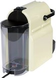 Machine à café à capsules Nespresso Inissia crème avec réservoir d'eau.