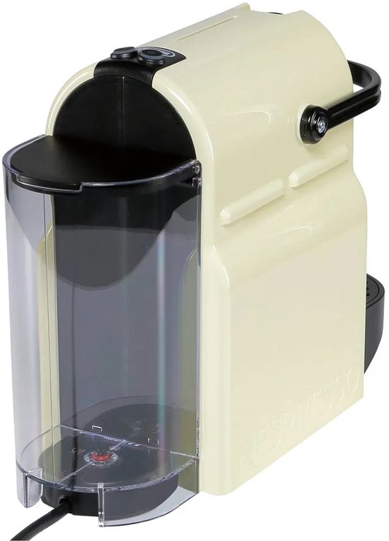 Machine à café à capsules Nespresso Inissia crème avec réservoir d'eau.