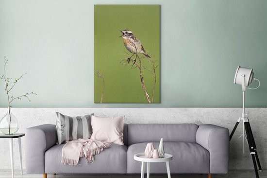 Tableau sur toile Un Whinchat chante sur une brindille - 90x140 cm - Décoration murale