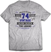 74 Jaar Legend - Feest kado T-Shirt Heren / Dames - Antraciet Grijs / Donker Blauw - Perfect Verjaardag Cadeau Shirt - grappige Spreuken, Zinnen en Teksten. Maat 3XL