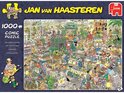Doos van een 1000-delige Jan van Haasteren puzzel 'Het Tuincentrum'. De afbeelding toont een drukke serre vol mensen, planten en kerstversiering.