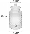 Glazen drankdispenser met honingraatstructuur en zilverkleurig kraantje, met afmetingen 32x15x11cm.