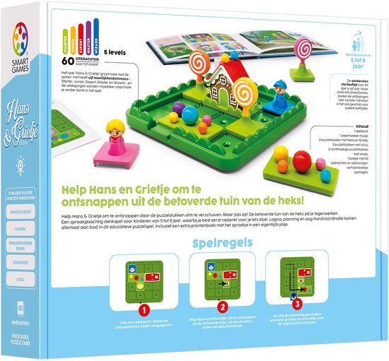 Doos van het spel Hans & Grietje. Een kind speelt het spel met het snoephuisje, de personages en de ballen op het groene speelbord. Inclusief kinderboek.