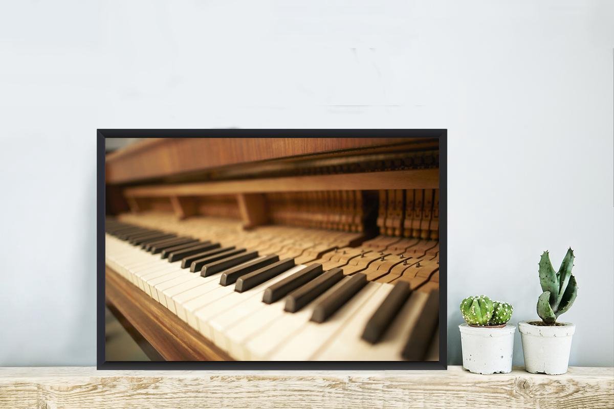 Photo en cadre - Un gros plan d'un cadre photo piano en bois noir