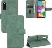 Voor Samsung Galaxy A41 (Japanse versie) Effen kleur Huidgevoel Magnetische gesp Horizontale flip-kalftextuur PU lederen tas met houder & kaartsleuven & portemonnee (groen)