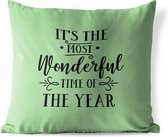 Buitenkussens - Tuin - Kerst quote It's the most wonderful time of the year tegen een groene achtergrond - 60x60 cm