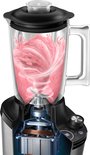 Dwarsdoorsnede van een Philips blender die een roze smoothie mixt.