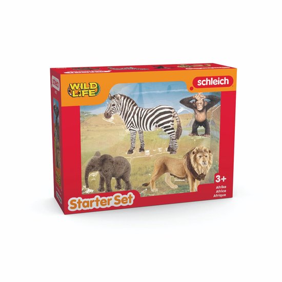 Schleich Starter Set 'Afrika' met een zebra, olifant, leeuw en aap. De figuren staan op een achtergrond van grasland.